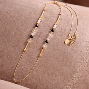 Extra-Long Gold Single-Strand Necklace – Beads with Clear and Black Facets, "C"
